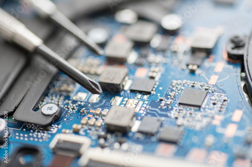 Professional repair of computers, laptops, boards. Screwdrivers, macro, close-up