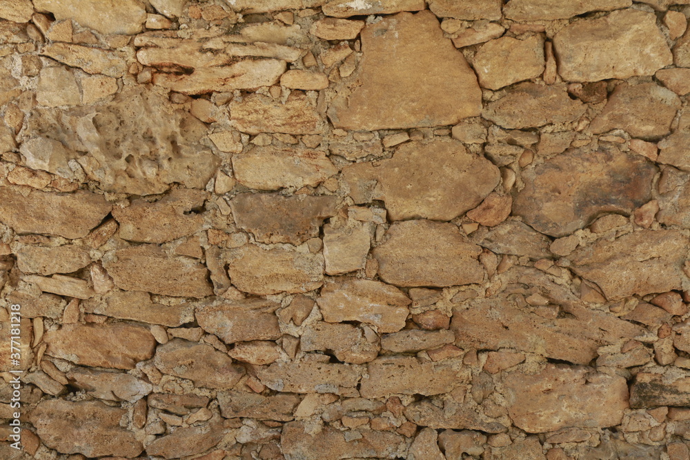 texture di muro di sassi marroni