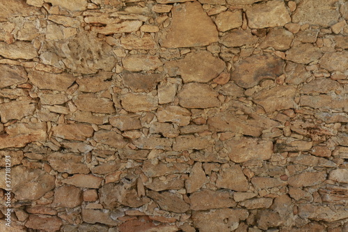 texture di muro di sassi marroni