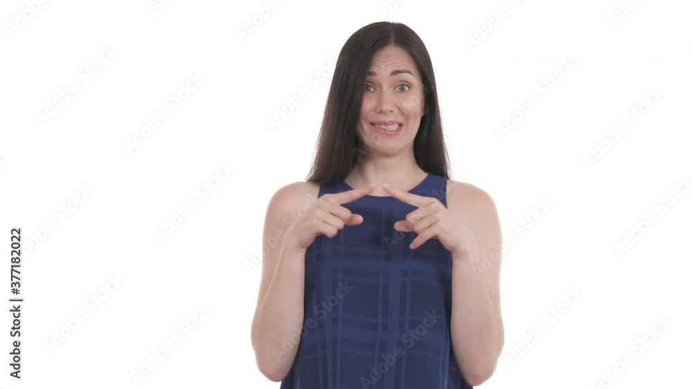 Caucasian woman tapping her index fingertips, expressing shy or nervous by facial expression. Body language and people feelings concept. Isolated on white background Caucasian woman tapping her index fingertips, expressing shy or nervous by facial expression. Body language and people feelings concept. Isolated on white background