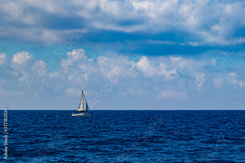 a sailing boat sailing in the sea