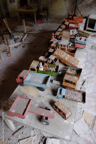 Old broken children's toys in an abandoned kindergarten in Pripyat. Toys in the Chernobyl radioactive zone.