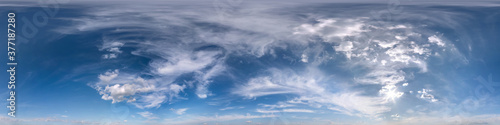 Seamless blue evening sky hdri panorama 360 degrees angle view with zenith and beautiful clouds for use in 3d graphics as sky dome or edit drone shot