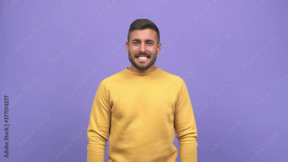 Young caucasian handsome man screaming angry, expression of madness and mental instability, madness concept Young caucasian handsome man screaming angry, expression of madness and mental instability, madness concept