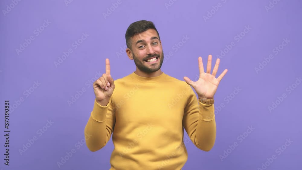 Young caucasian handsome man showing number six, symbol of counting, concept of mathematics, confident and cheerful Young caucasian handsome man showing number six, symbol of counting, concept of mathematics, confident and cheerful