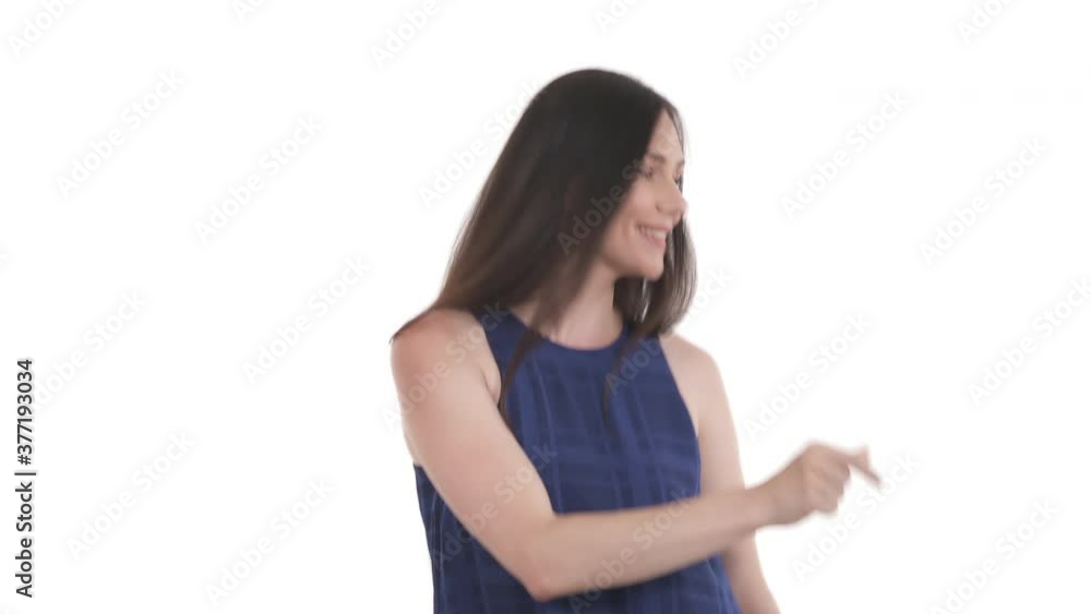 Joyful Caucasian woman having fun at camera, doing dancing moves. Isolated on white background. Joyful Caucasian woman having fun at camera, doing dancing moves. Isolated on white background.