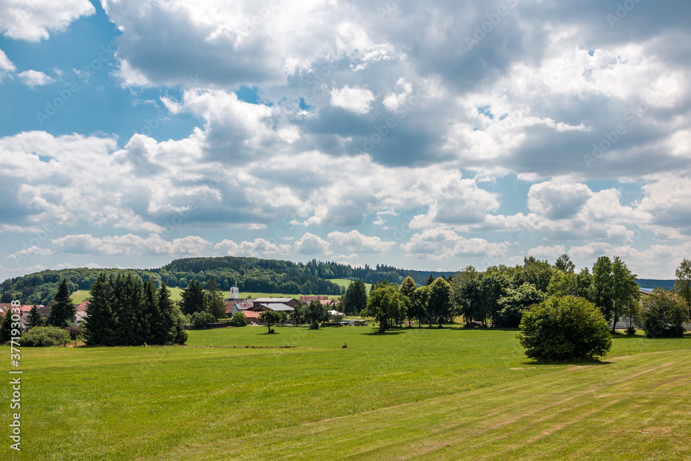 Little village in the middle of the german countryside with hills, forests, fields and meadows Little village in the middle of the german countryside with hills, forests, fields and meadows