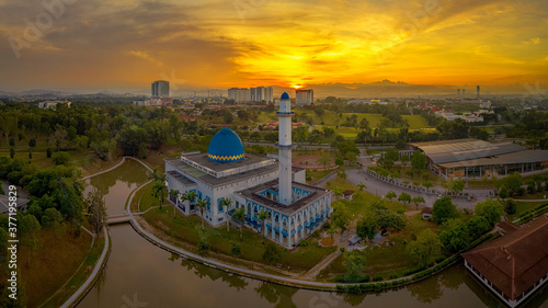 Photography A sunrise scene of local muslim mosque taken via drone during a lockdown from Kuala Lumpur, Malaysia