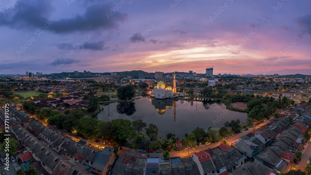 A sunrise scene of local muslim mosque taken via drone during a lockdown from Kuala Lumpur, Malaysia.