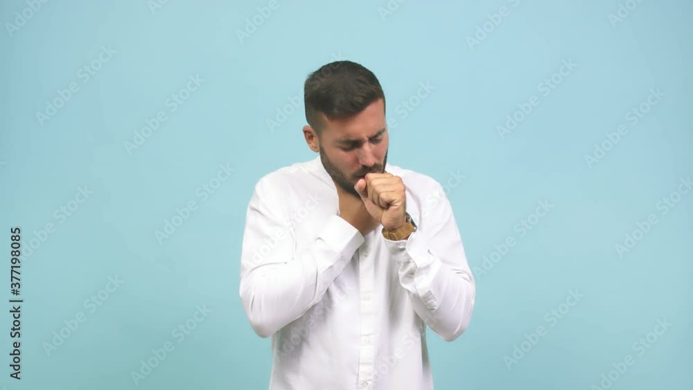 Young caucasian handsome man coughing, concept of virus or disease Young caucasian handsome man coughing, concept of virus or disease