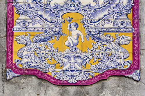 panels of polychrome azulejos on the walls of a beautiful ruined house in Setubal