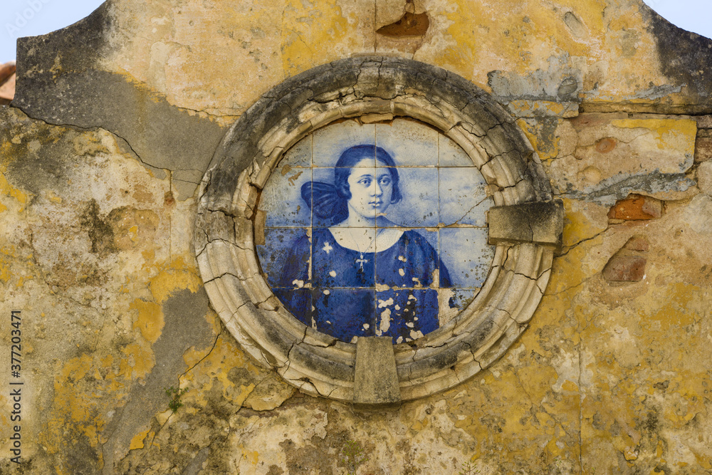 Obraz premium panels of blue and white azulejos on the walls of a beautiful ruined house in Setubal