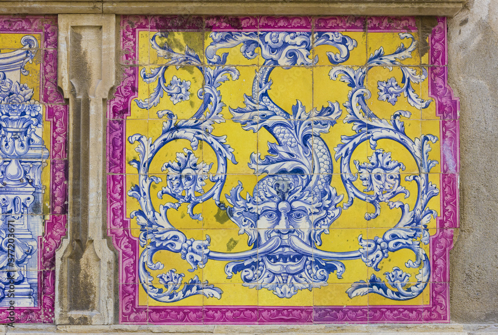 panels of polychrome azulejos on the walls of a beautiful ruined house in Setubal