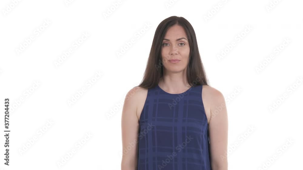 Caucasian woman waving both hands, showing so-so gesture with dismissive facial expression. Isolated on white background Caucasian woman waving both hands, showing so-so gesture with dismissive facial expression. Isolated on white background