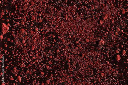 The texture is crumbly red.
