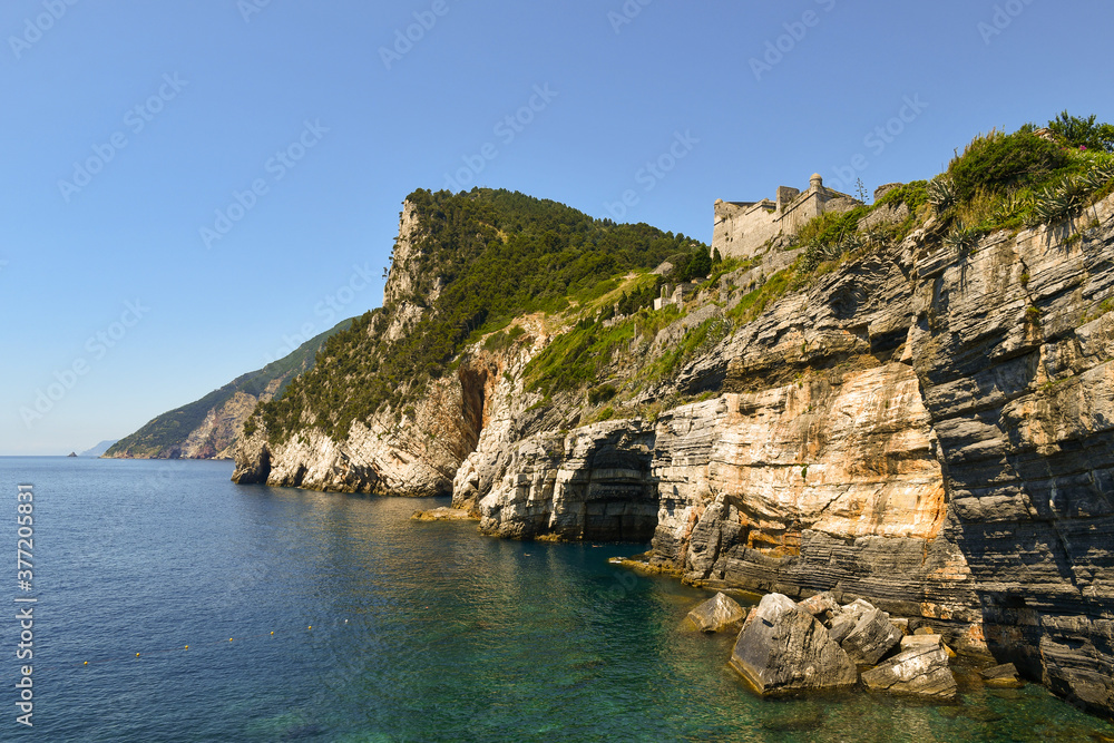 Scenic view of the bay with the famous Byron's Grotto, named after Lord Byron (1788–1824), an English poet and diplomat who took refuge in this cave to meditate, Porto Venere, Liguria, Italy