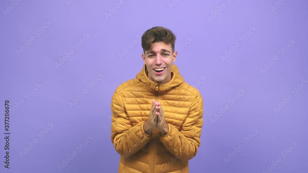 Young caucasian student man surprised, feels successful and prosperous, is very lucky Young caucasian student man surprised, feels successful and prosperous, is very lucky