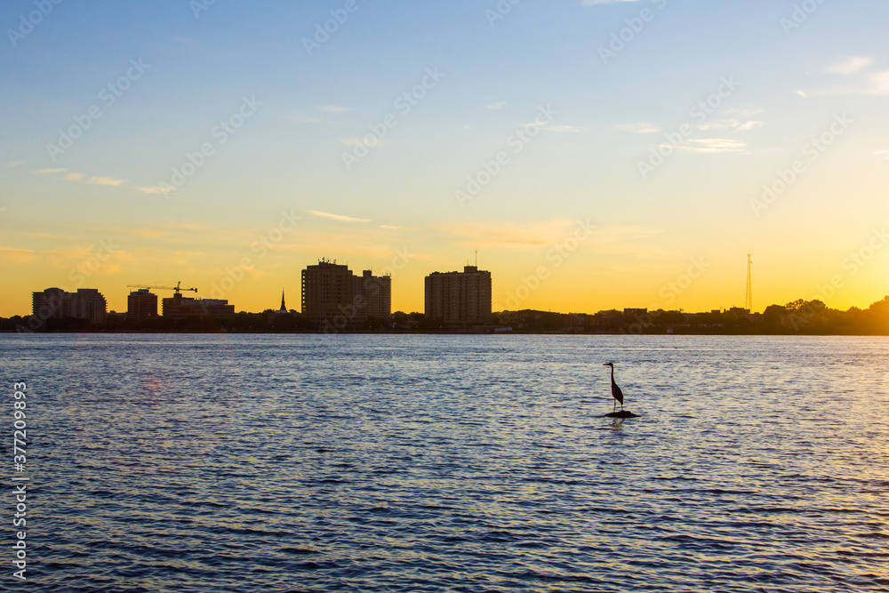 Fototapeta premium Sunrise Over Sarnia, Ontario. Beautiful sunrise over the waterfront district of Sarnia in the Canadian Province of Ontario.