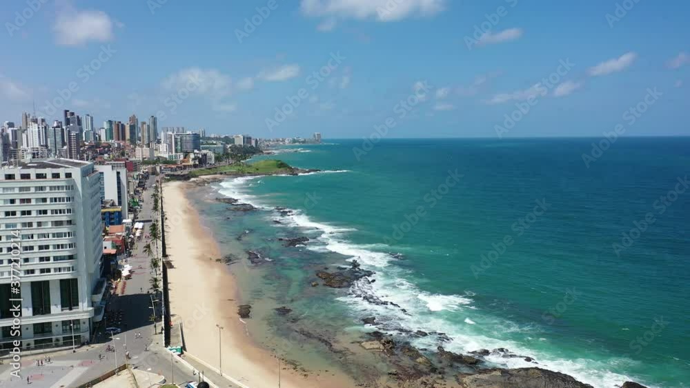 Coastline beach scene, Salvador, Bahia, Brazil. Coastline view. Beach scene. Farol da Barra, lighthouse view, Salvador, Bahia, Brazil. Coastline city view on the beach. Coastline beach scene, Salvador, Bahia, Brazil. Coastline view. Beach scene. Farol da Barra, lighthouse view, Salvador, Bahia, Brazil. Coastline city view on the beach.