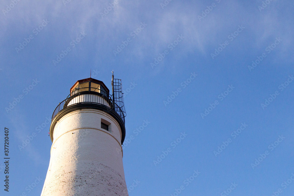 Lighthouse Background With Copy Space. The Fort Gratiot lighthouse on Lake Huron is one of the oldest lighthouses on the Great Lakes and is located in Port Huron, Michigan, USA. Lighthouse Background With Copy Space. The Fort Gratiot lighthouse on Lake Huron is one of the oldest lighthouses on the Great Lakes and is located in Port Huron, Michigan, USA.