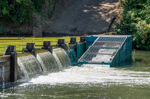 Seasonal dam on the Russian River at Guerneville, California provides additional water for swimming and boating during the summer months. A fish ladder is installed to allow for the passage of fish.