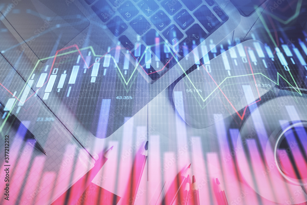 Double exposure of financial chart drawing over table background with computer. Concept of research and analysis. Top view. Double exposure of financial chart drawing over table background with computer. Concept of research and analysis. Top view.