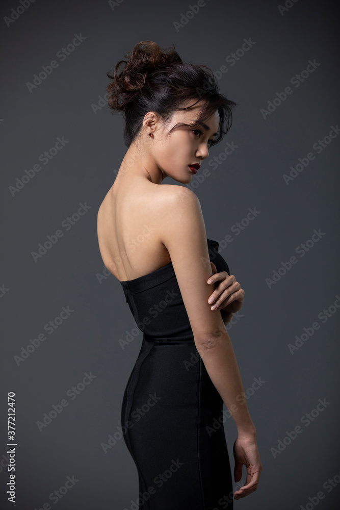 Beautiful young woman in black dress Beautiful young woman in black dress