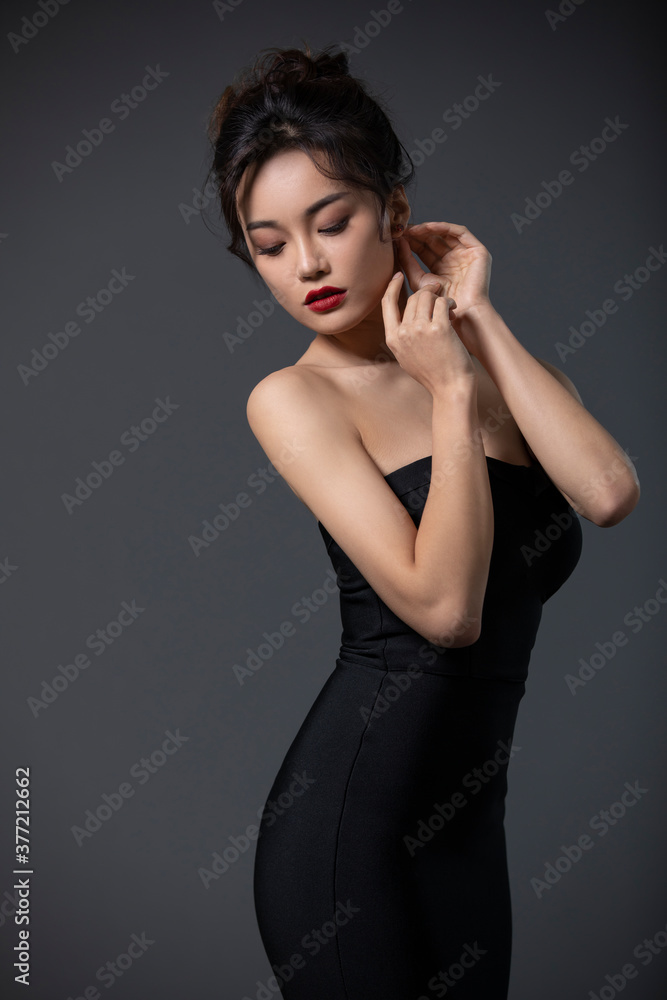 Beautiful young woman in black dress Beautiful young woman in black dress