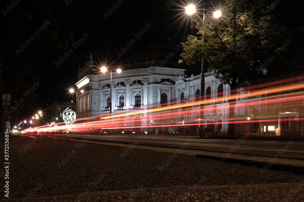 Fototapeta premium VIENNA, AUSTRIA - AUGUST 27, 2019. Vienna night with traces of lights from vehicles