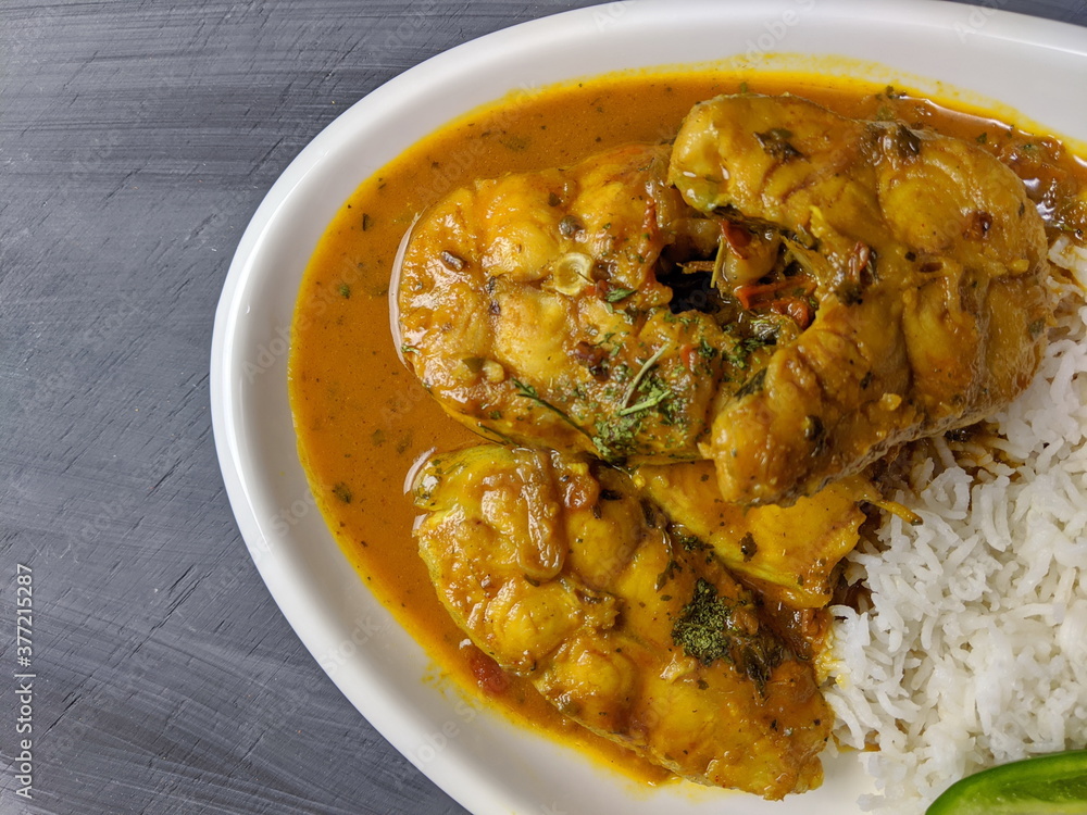 A platter of North Indian style Fish curry with Rice Stock Photo
