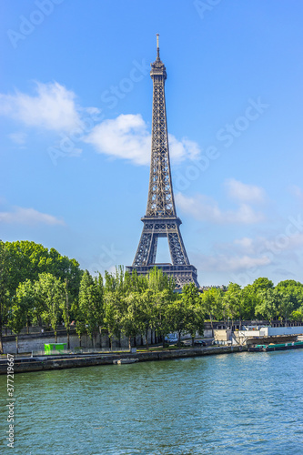 Tour Eiffel  Eiffel Tower  located on Champ de Mars  named after engineer Gustave Eiffel. Eiffel Tower is tallest structure in Paris and most visited monument in world. Paris  France.