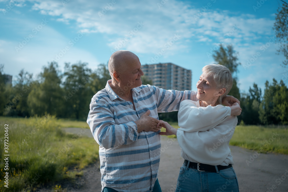 happy senior couple have romantic dating and dance at sunny day outdoor happy senior couple have romantic dating and dance at sunny day outdoor