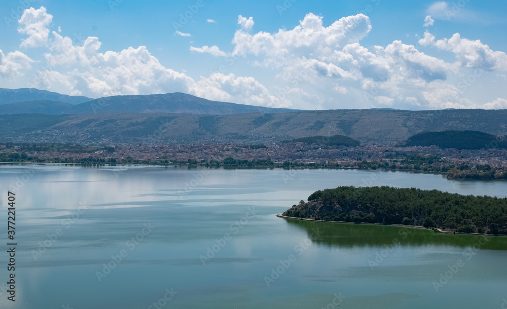 Aerial view of the lake Pamvotis with city on the background