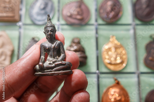 Small Buddha image or Thai Amulets & Talismans
