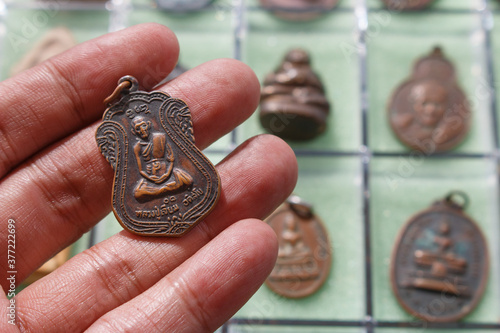 Obraz na płótnie Small Buddha image or Thai Amulets & Talismans w salonie