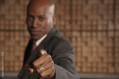 African American businessman pointing photo