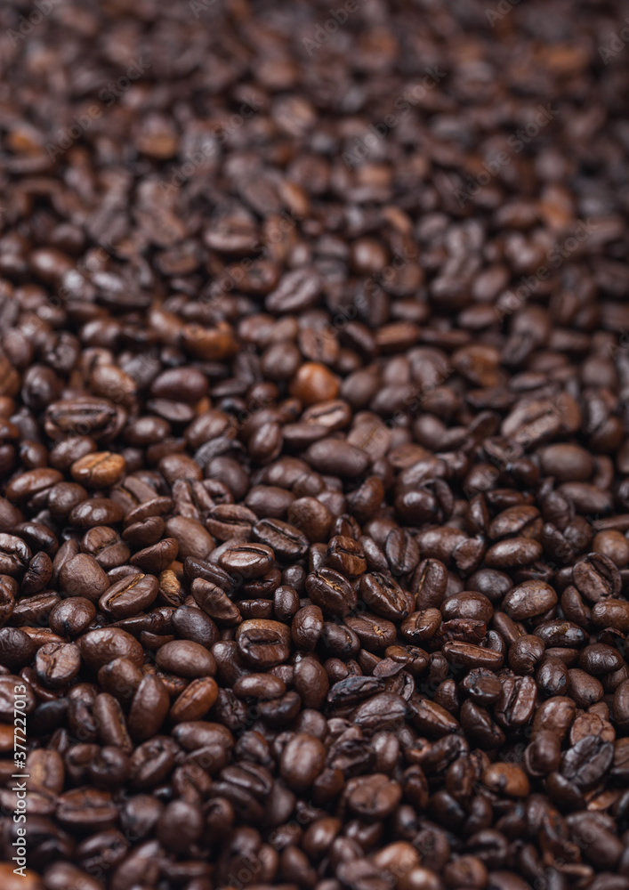 Fresh raw organic coffee beans top view background. Fresh raw organic coffee beans top view background.
