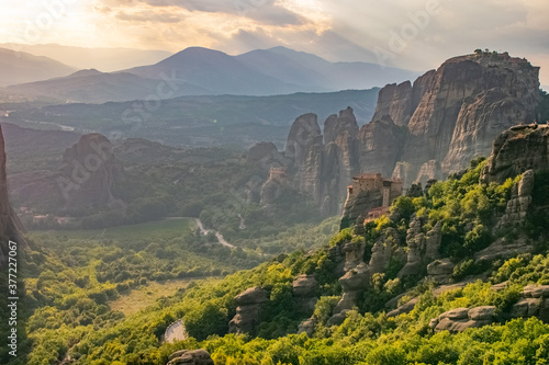 Sunshine through the mist of Meteora in the early morning
