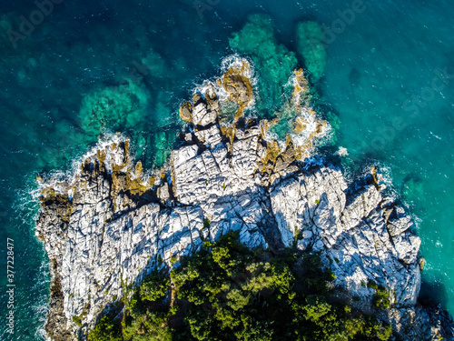 The beautiful coast of Damouchari beach and the deep blue sea at Pelion Peninsula, Greece. Photo taken whit drone.