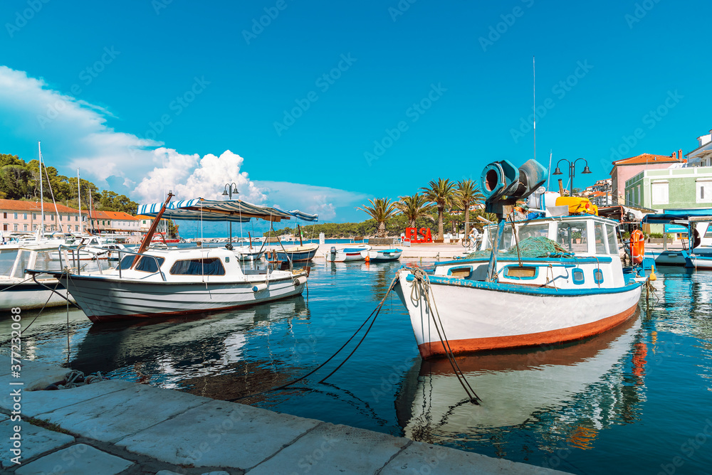 Obraz Boats on the pier in Jelsa town, Hvar, Croatia.