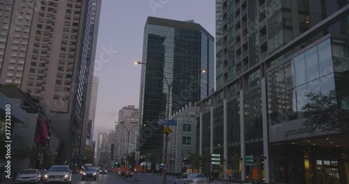 Wallpaper Mural Montreal, Canada - April 15th 2017 : Tilt shot while driving on Rene Levesque Boulevard with view of La Laurentienne Building and other downtown skyscrapers. Torontodigital.ca