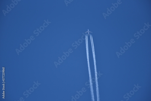 Jet airplane in the blue sky