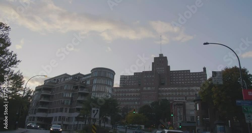 Montreal, QC, Canada - April 15, 2017: worm eye shot while driving on Cote des Neiges Road, a view of The General Hospital, Seaforth Medical Building. photo