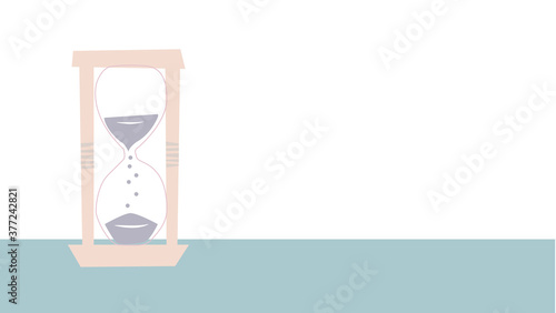 Hourglass on color background. 砂時計、レトロ砂時計、ゆとりの時間、時間管理、タイムマネジメントのコンセプト