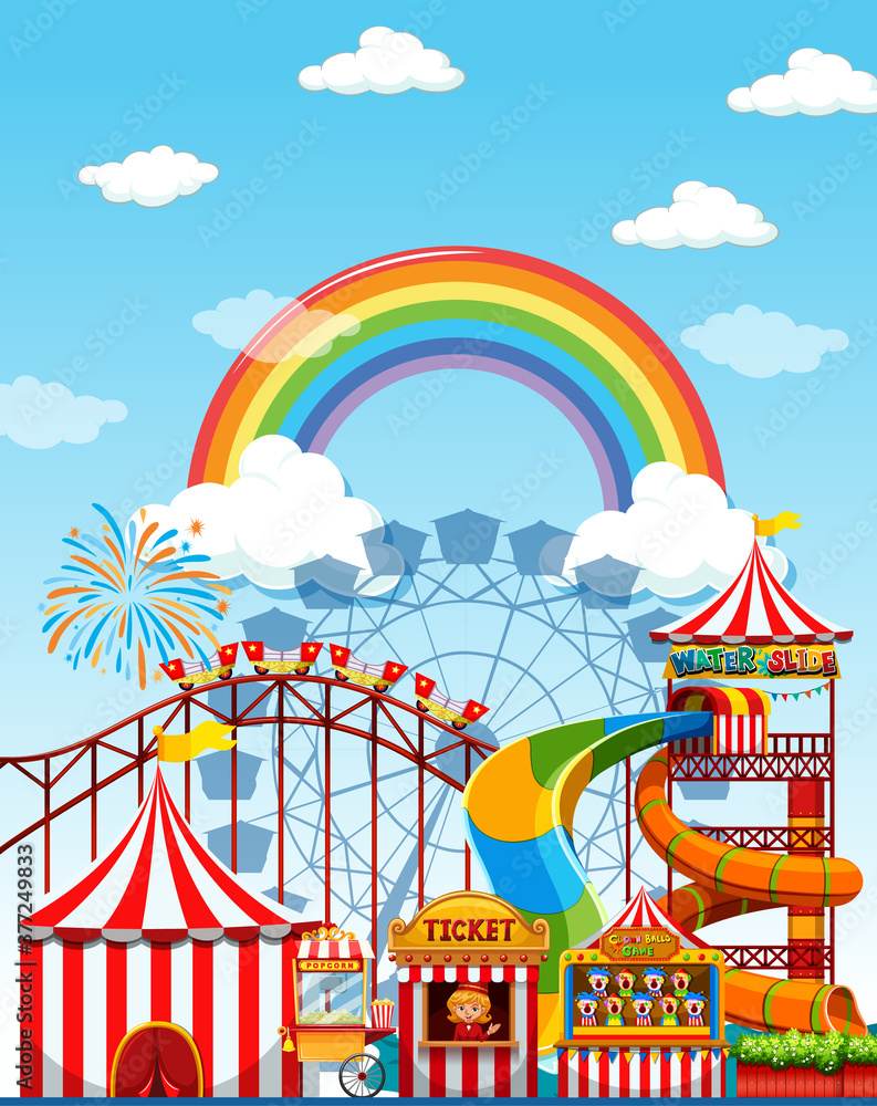 Amusement park scene at daytime with rainbow in the sky Amusement park scene at daytime with rainbow in the sky