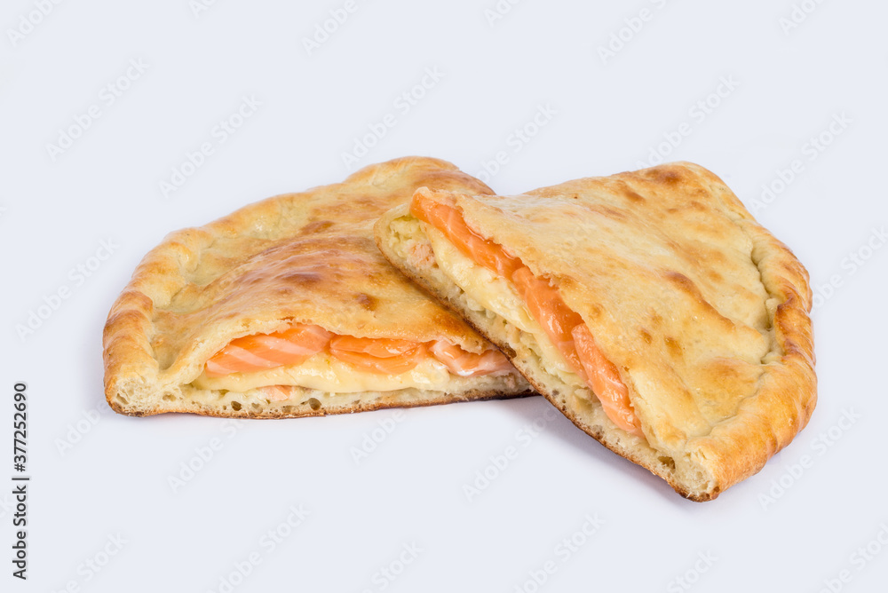 Calzone cut on a white plate for tenderloin