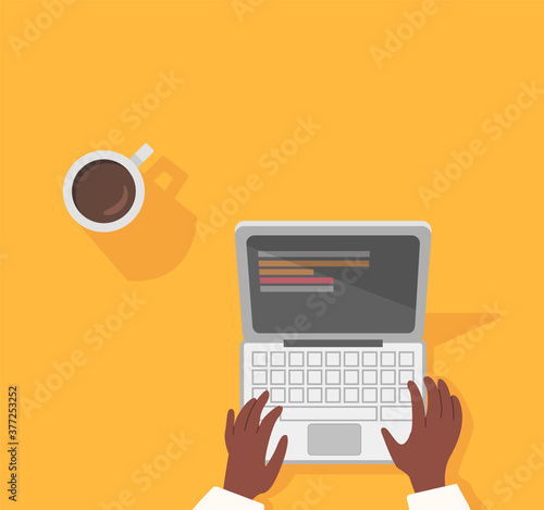 working in quarantine with a laptop. working at home and self-employed.  developer working on a table.