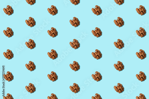 Seamless pattern with walnut. Abstract background.