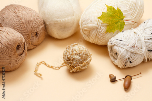 Woolen yarn for knitting. Balls of natural wool yarn.