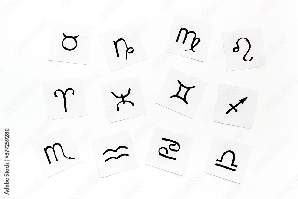 Horoscope astrology concept. Zodiac signs, top view Horoscope astrology concept. Zodiac signs, top view